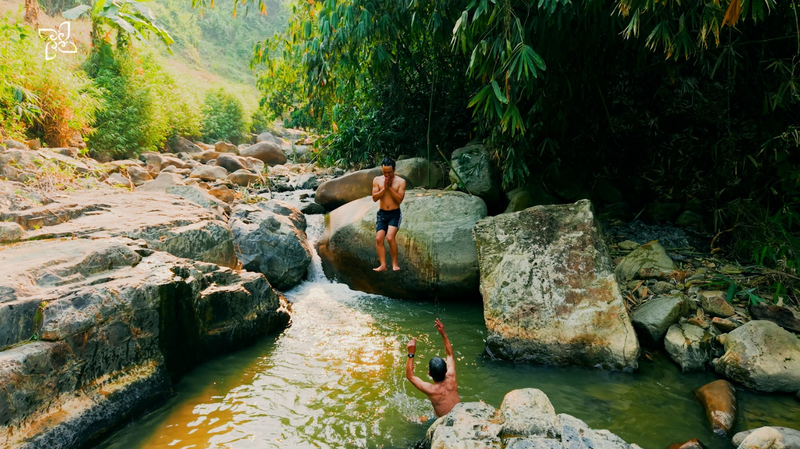 Bathing in the stream and catching fish with the locals.